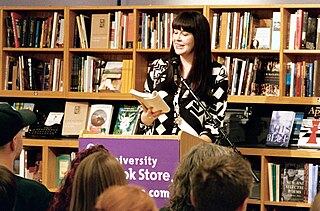 Caitlin Doughty reading aloud her book in a bookstore